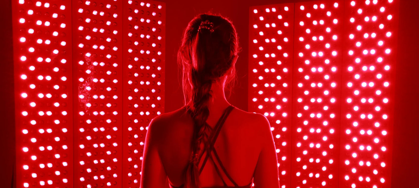 Near-infrared light therapy device being used on a healing scar to improve collagen remodeling, reduce inflammation, and speed skin recovery.