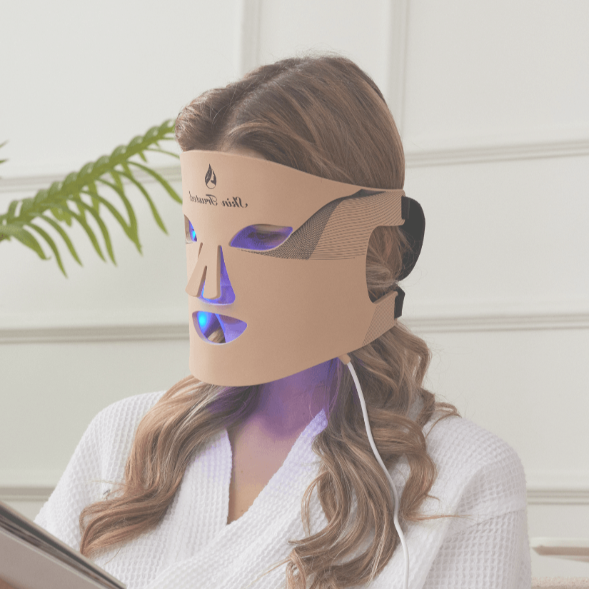 Model showing blue light wavelength at 415–465 nm penetrating the surface layer of skin to target acne-causing bacteria